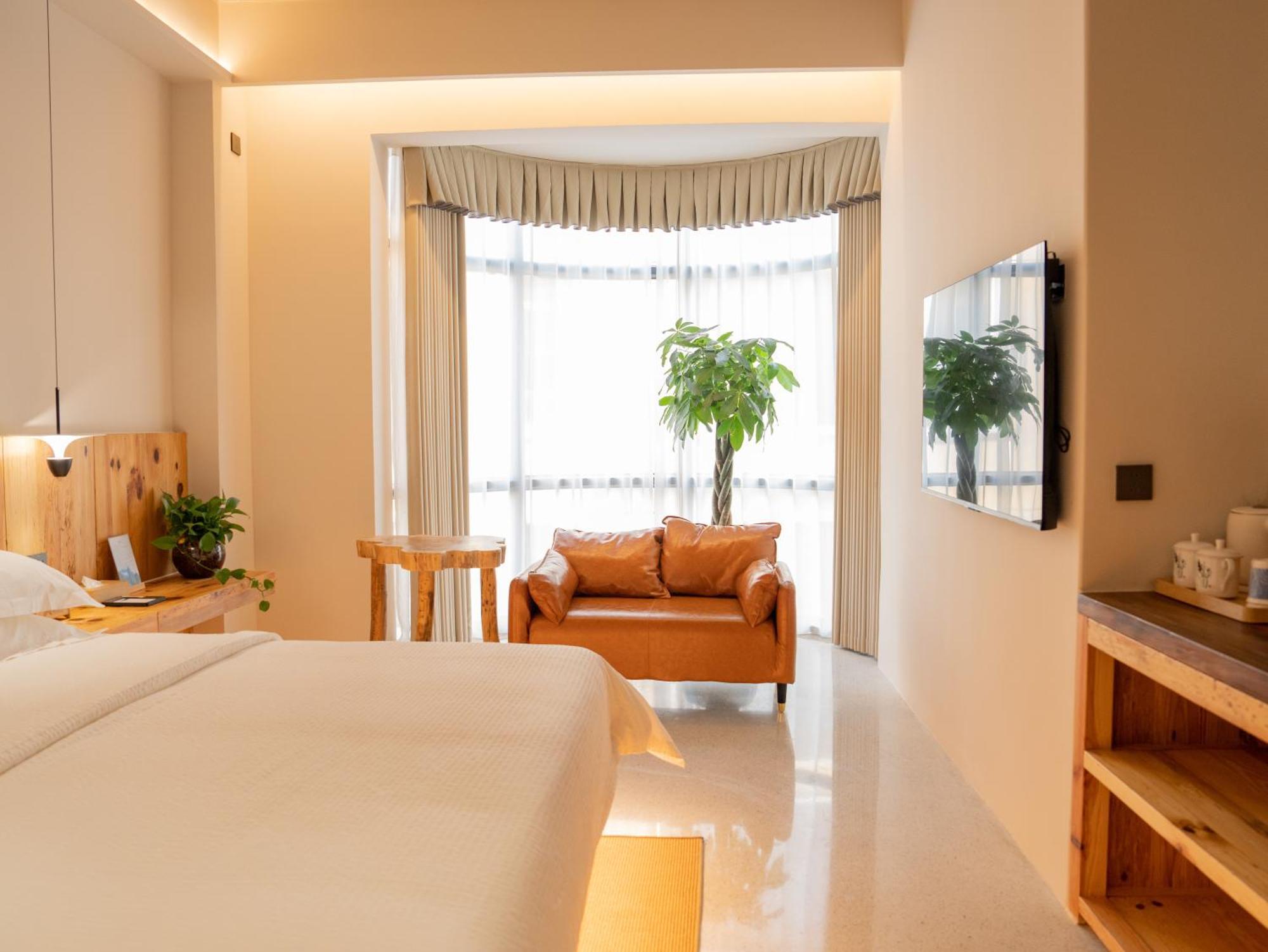 Patio Spring Holiday Inn -- Free Round Trip Pick-Up Service --Panoramic View Of Tianmen Mount Čang-ťia-ťie Exteriér fotografie